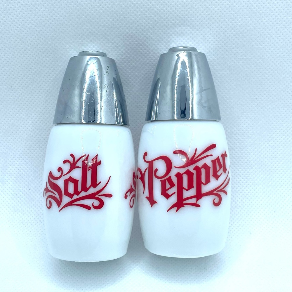 Vintage White Milk Glass Salt and Pepper Shaker. Silver Tops W/ Red Writing